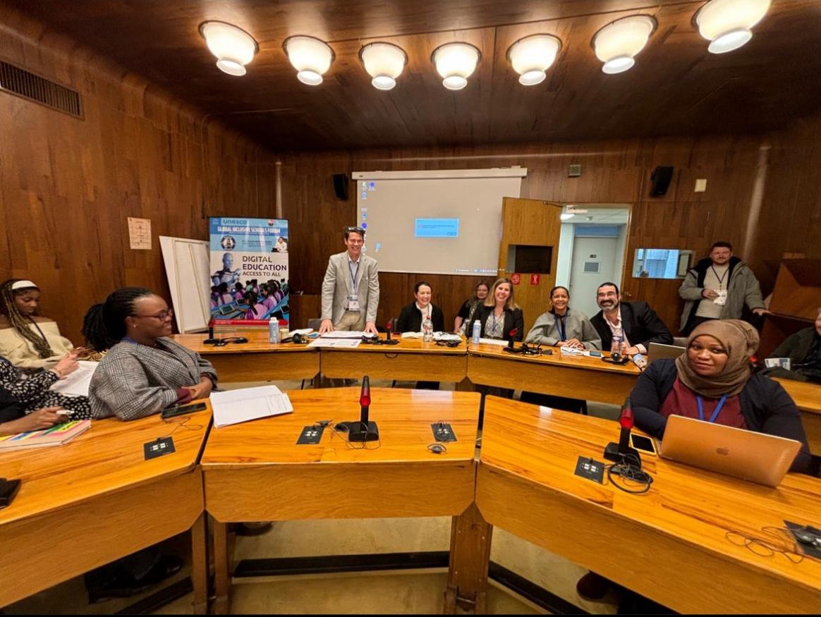 IFIP Parents picture whole panel IFIP-UNESCO Global Inclusive Schools' Forum 14 March 2024 session on Scalable initiatives involving parents and communities. Photo of panelists before session start (left to right): Leo Thompson (standing), Clemmie Stewart, Cheryl Chalkley, Jasmane Frans, and Jon Springer.
